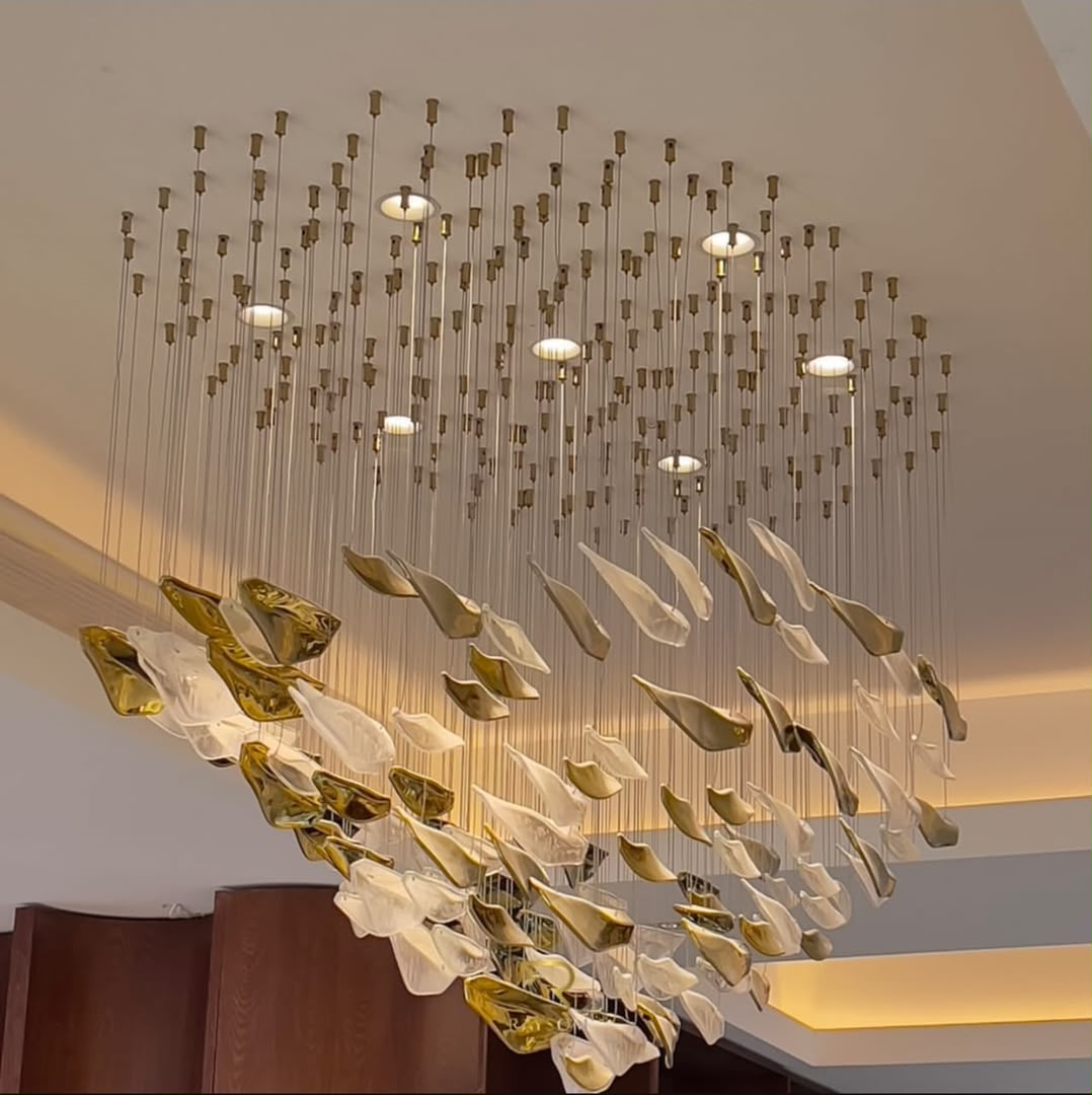 Sculptural suspended glass-leaf chandelier